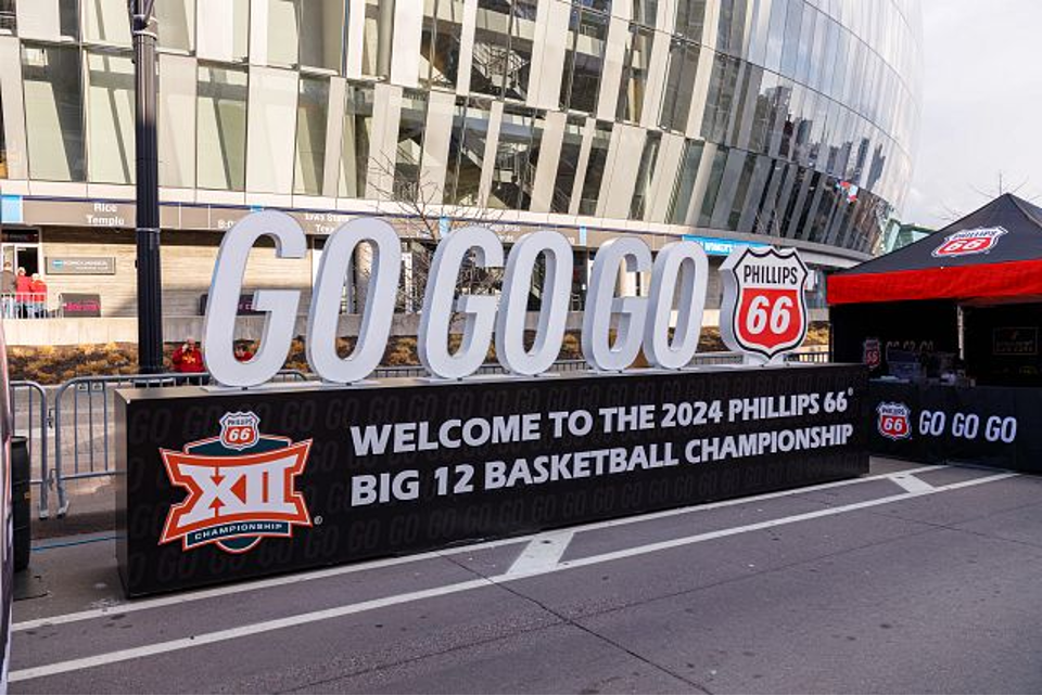 GO GO GO Phillips 66 Signage outside of a football stadium.